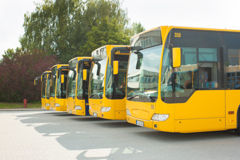 Busses parking in row on bus station or terminal waiting for their next service