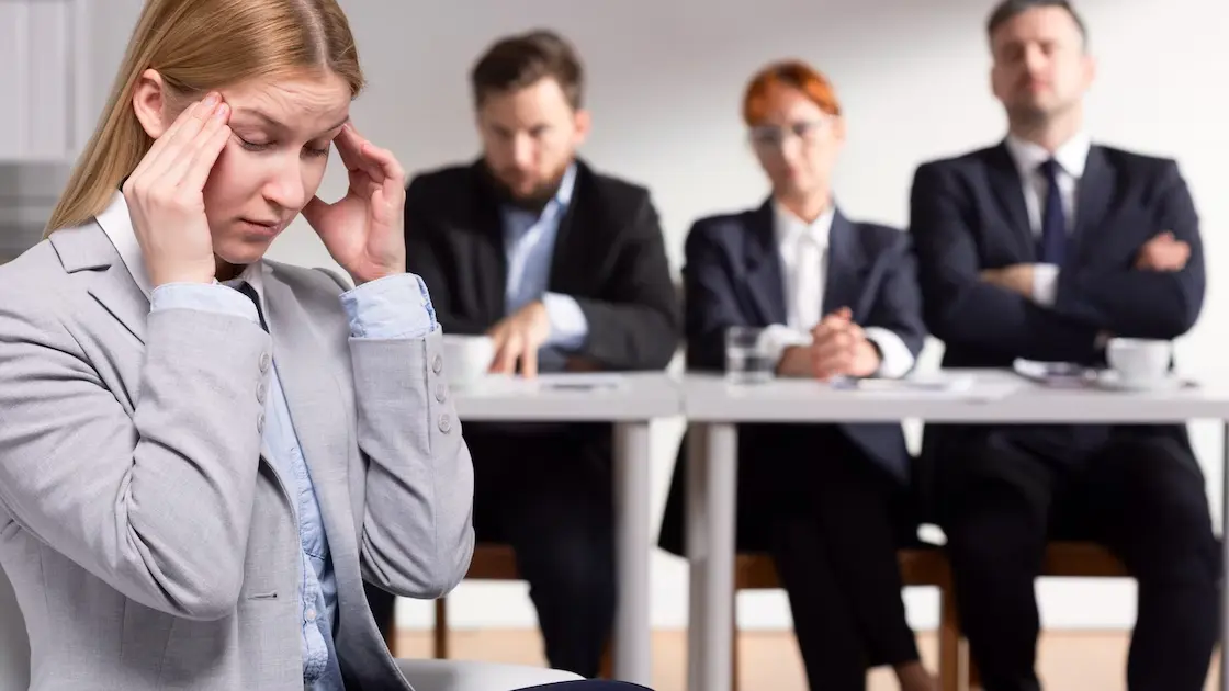 an employee feeling stressed during an interview having a Job Interview Stress